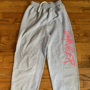 Grey sweatpants with dancer on the side